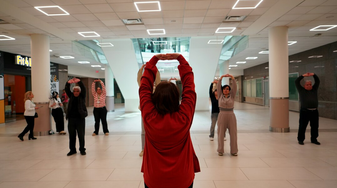 elderly woman doing yoga