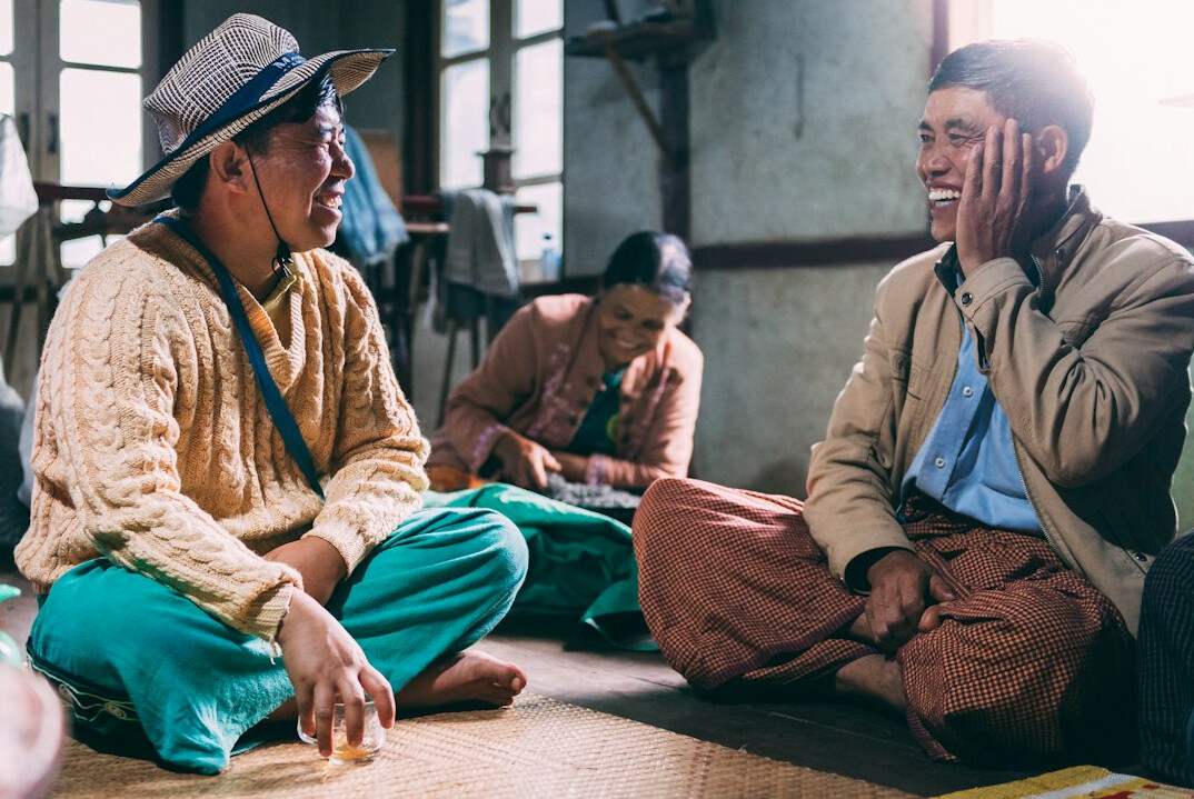 group of elderly friends chatting